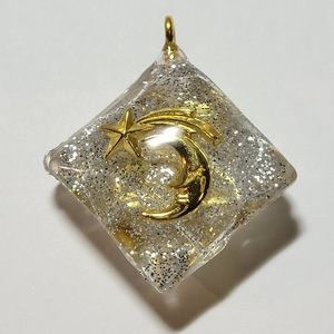 Double sided space pendant.